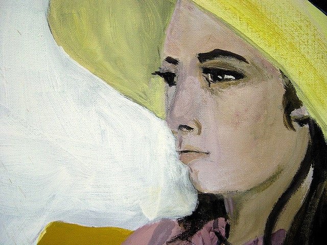 لوحة فنية لامرأة ترتدي قبعة صفراء
